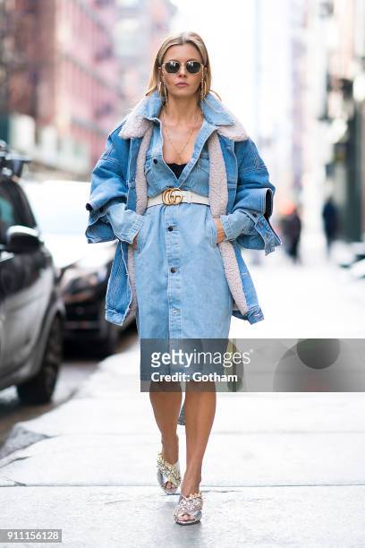 Elizabeth Sulcer is seen wearing a TNA dress, Marcelo Burlon jacket, Gedebe shoes with Alessandra Rich glasses, Gucci belt and Jennifer Fisher...