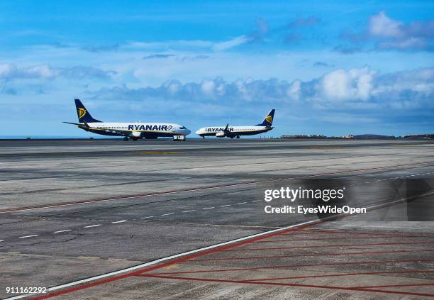 Ryanair passenger jets at the gate of southern airport Aeropuerto Reina Sofia del Sur on January 08, 2018 in Tenerife, Spain.