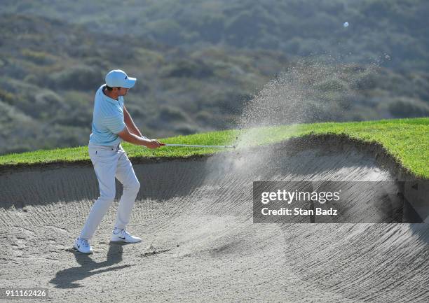 Harris English plays a bunker shot on the third hole during the third round of the Farmers Insurance Open at Torrey Pines South on January 27, 2018...