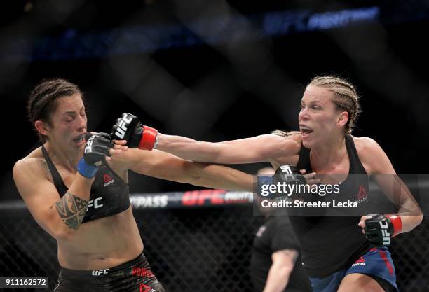 Katlyn Chookagian throws a punch against Mara Romero Borella of Italy during UFC Fight Night at Spectrum Center on January 27, 2018 in Charlotte,...