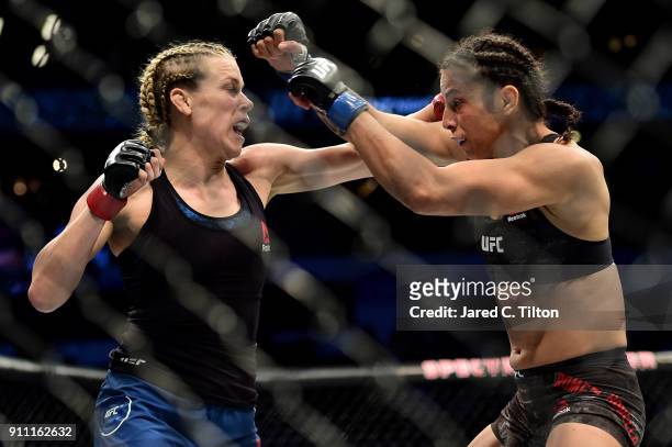 Katlyn Chookagian punches Mara Romero Borella of Italy in their flyweight bout during the UFC Fight Night event inside the Spectrum Center on January...