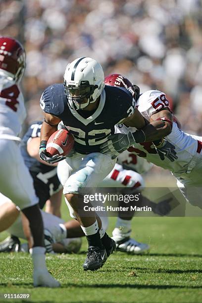 Running back Evan Royster of the Penn State Nittany Lions carries the ball during a game against the Temple Owls on September 19, 2009 at Beaver...