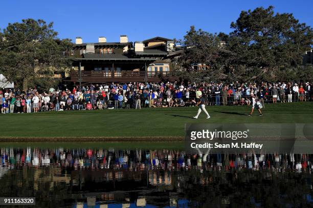 Ryan Palmer walks up the on the 18th hole fairway during the third round of the Farmers Insurance Open at Torrey Pines South on January 27, 2018 in...