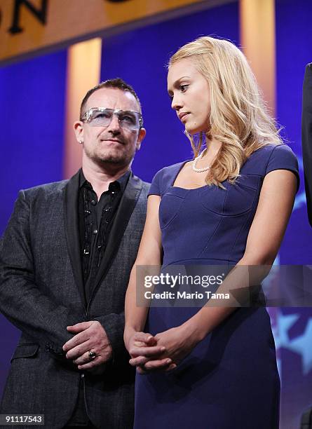 Singer Bono and actress Jessica Alba appear at the Clinton Global Initiative on September 24, 2009 in New York City. The Fifth Annual Meeting of the...