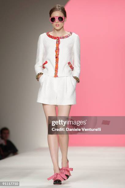 Model walks down the runway during the Moschino Cheap & Chic Fashion Show as part of the Milan Womenswear Fashion Week Spring/Summer 2010 at the...