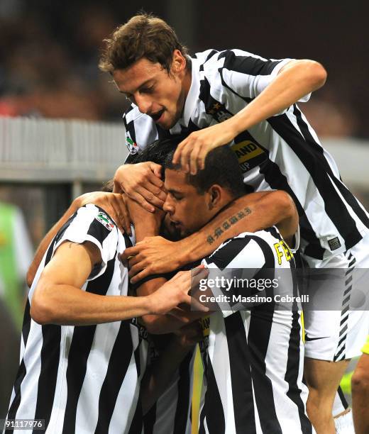 Players of Juventus FC celebrate the first goal scored by Vincenzo Iaquinta during the Serie A match between Genoa CFC and SSC Juventus FC at Stadio...