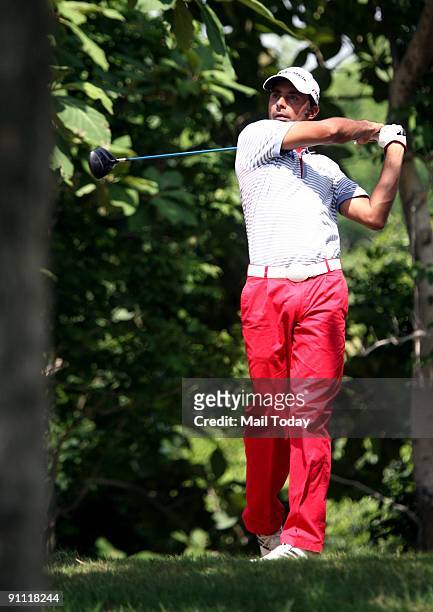 Indian Golfer Jyoti Randhawa in action during the third round of the DLF masters golf tournament on Saturday.