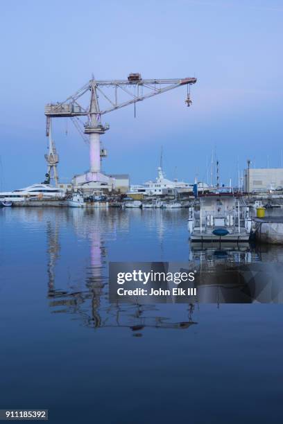 la ciotat harbor with shipping cranes - la ciotat stock pictures, royalty-free photos & images