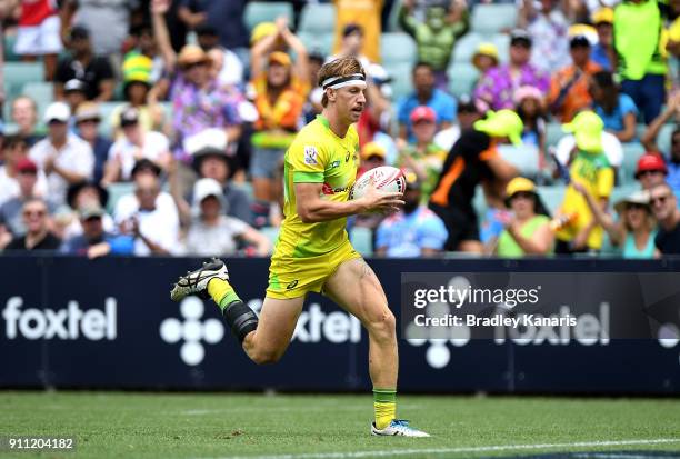 Ben O'Donnell of Australia breaks away from the defence to score a try in the quarter final match against New Zealand during day three of the 2018...