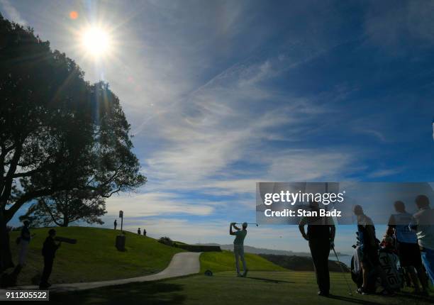 Harris English plays a tee shot on the third hole during the third round of the Farmers Insurance Open at Torrey Pines South on January 27, 2018 in...