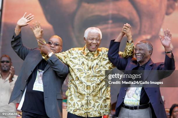 South Africa. Gauteng. Former South African president and freedom fighter Nelson Mandela celebrates his 90th birthday with president Thabo Mbeki and...