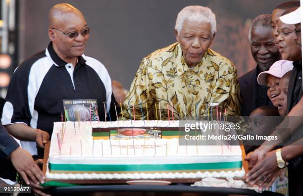 South Africa. Gauteng. Former South African president and freedom fighter Nelson Mandela celebrates his 90th birthday with president Thabo Mbeki and...