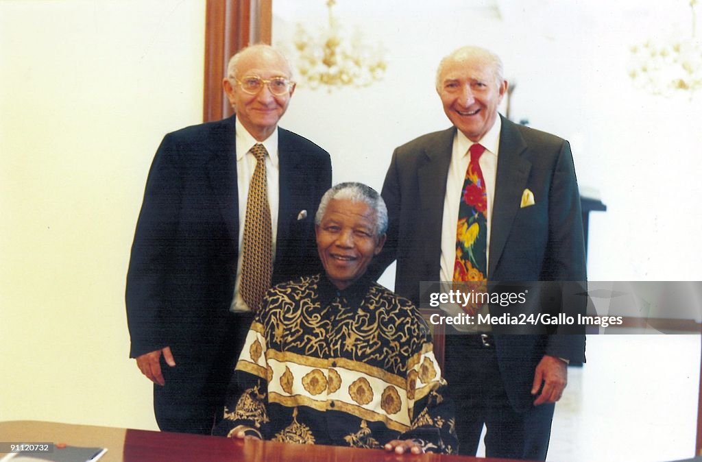 Former President Nelson Mandela with Solly Krok and his brother.
