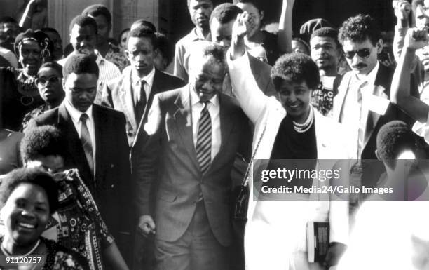 Former President Nelson Mandela and his wife Winnie Madikizela Mandea at the High Court.
