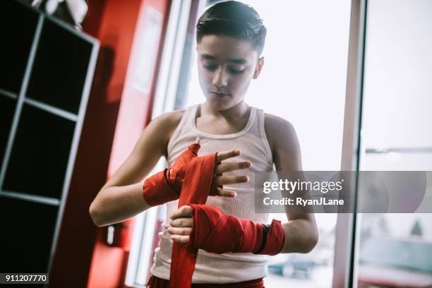 Young Man In Kickboxing Training Center
