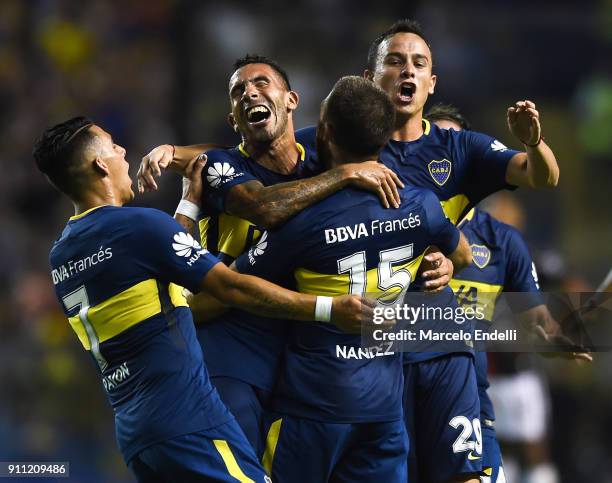 Nahitan Nandez of Boca Juniors celebrates with teammates Leonardo Jara , Carlos Tevez and Cristian Pavon after scoring the second goal of his team...