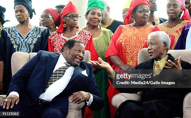 South Africa. Gauteng. Business magnate and mall tycoon, Richard Maponya gestures to former president of South Africa, Nelson Mandela on the opening...