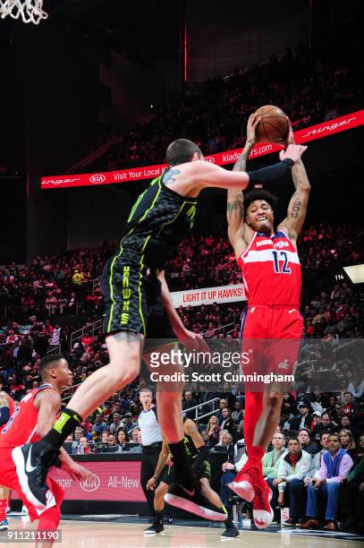 Kelly Oubre Jr. #12 of the Washington Wizards grabs the rebound against the Atlanta Hawks against the Washington Wizards on January 27, 2018 at...