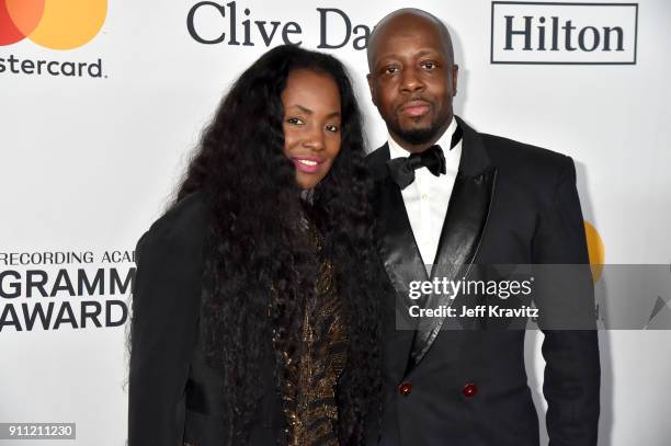 Claudinette Jean and recording artist Wyclef Jean attend the Clive Davis and Recording Academy Pre-GRAMMY Gala and GRAMMY Salute to Industry Icons...