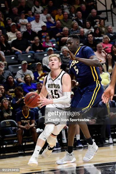 Trevor Stumpe guard Wofford College Terriers gets position on Peter Jurkin center East Tennessee State University Buccanneers and drives to the...