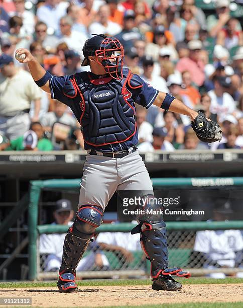 Kelly Shoppach of the Cleveland Indians throws to second base against the Detroit Tigers during the game at Comerica Park on September 3, 2009 in...
