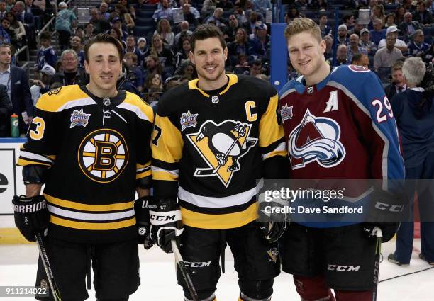 Brad Marchand of the Boston Bruins, Sidney Crosby of the Pittsburgh Penguins and Nathan MacKinnon of the Colorado Avalanche look on during the Honda...