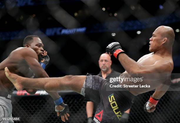 Ronaldo "Jacare" Souza of Brazil kicks Derek Brunson during UFC Fight Night at Spectrum Center on January 27, 2018 in Charlotte, North Carolina.