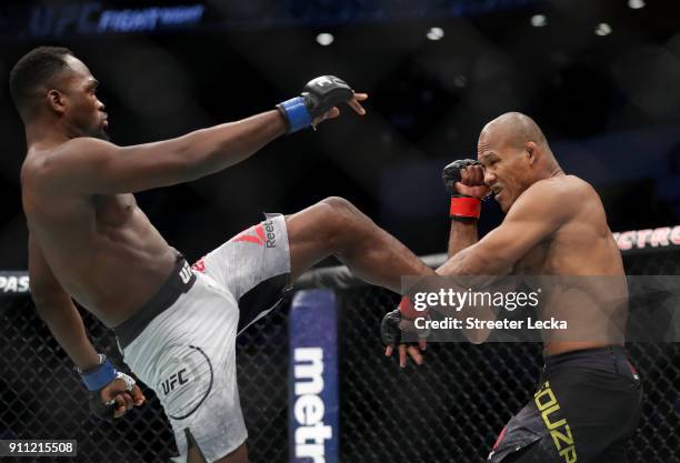 Derek Brunson kicks Ronaldo "Jacare" Souza of Brazil in their middleweight bout during UFC Fight Night at Spectrum Center on January 27, 2018 in...