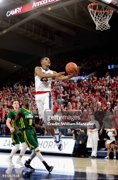 Zach Norvell Jr. #23 of the Gonzaga Bulldogs goes to the basket against Souly Boum of the San Francisco Dons in the second half at McCarthey Athletic...