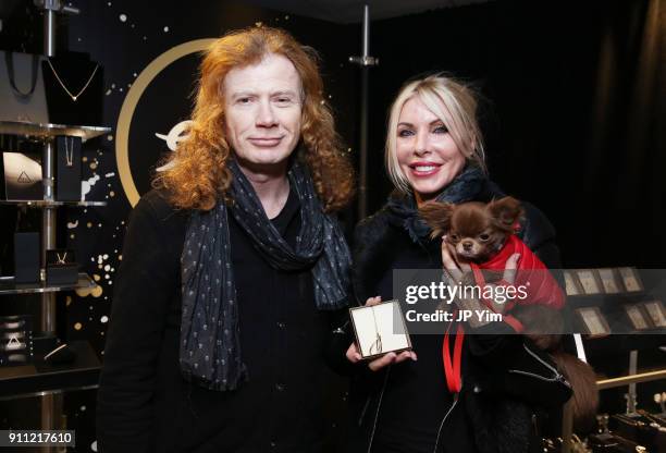 Musician Dave Mustaine and Pamela Anne Casselberry attend the GRAMMY Gift Lounge during the 60th Annual GRAMMY Awards at Madison Square Garden on...