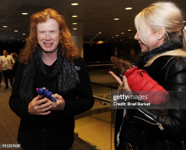 Musician Dave Mustaine and Pamela Anne Casselberry attend the GRAMMY Gift Lounge during the 60th Annual GRAMMY Awards at Madison Square Garden on...