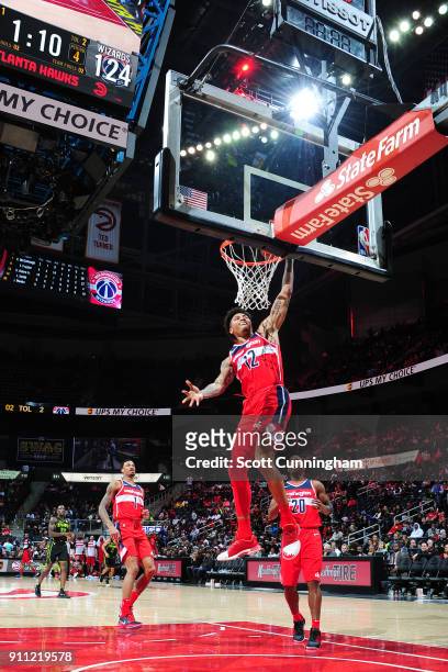 Kelly Oubre Jr. #12 of the Washington Wizards dunks against the Atlanta Hawks on January 27, 2018 at Philips Arena in Atlanta, Georgia. NOTE TO USER:...