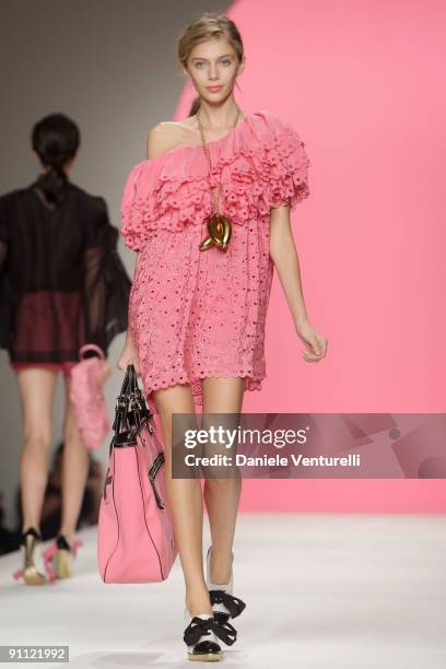 Model walks down the runway during the Moschino Cheap & Chic Fashion Show as part of the Milan Womenswear Fashion Week Spring/Summer 2010 at the...