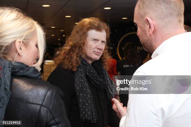 Musician Dave Mustaine and Pamela Anne Casselberry attend the GRAMMY Gift Lounge during the 60th Annual GRAMMY Awards at Madison Square Garden on...