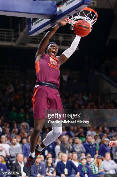Chris Clarke of the Virginia Tech Hokies dunks the ball to seal the game against the Notre Dame Fighting Irish at Purcell Pavilion on January 27,...