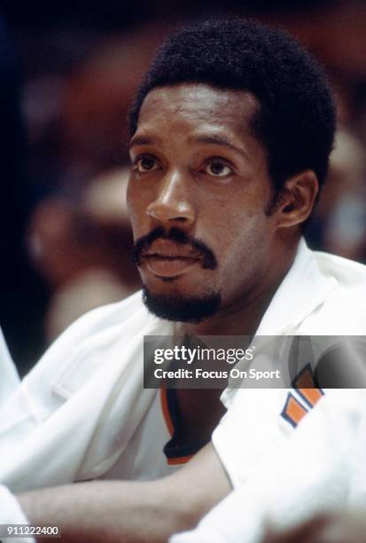 Harthorne Wingo of the New York Knicks looks on from the bench during an NBA basketball game circa 1975 at Madison Square Garden in the Manhattan...