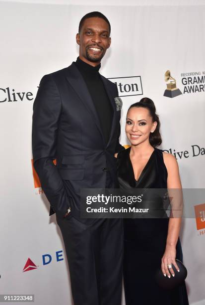 Basketball player Chris Bosh and Adrienne Williams Bosh attend the Clive Davis and Recording Academy Pre-GRAMMY Gala and GRAMMY Salute to Industry...