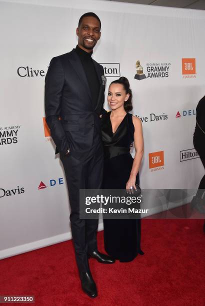 Basketball player Chris Bosh and Adrienne Williams Bosh attend the Clive Davis and Recording Academy Pre-GRAMMY Gala and GRAMMY Salute to Industry...