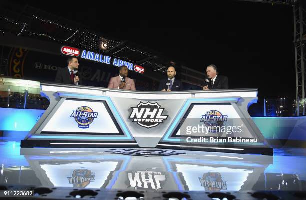 Network panel Tony Luftman, Kevin Weekes, Mike Rupp and Barry Melrose appear on set during 2018 GEICO NHL All-Star Skills Competition at Amalie Arena...