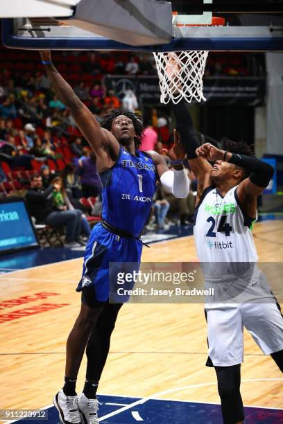 Johnathan Motley of the Texas Legends goes up for a layup against Justin Patton of the Iowa Wolves in an NBA G-League game on January 27, 2018 at the...