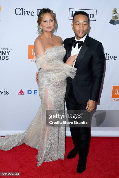 Personality Chrissy Teigen and recording artist John Legend attend the Clive Davis and Recording Academy Pre-GRAMMY Gala and GRAMMY Salute to...