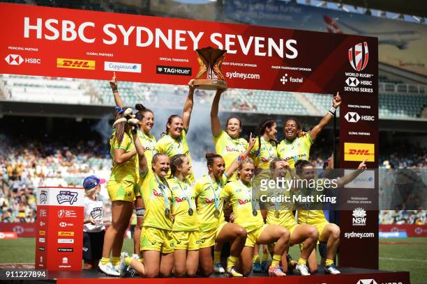 Australia celebrate victory after defeating New Zealand in the Women's Final match during day three of the 2018 Sydney Sevens at Allianz Stadium on...