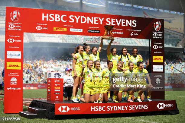 Australia celebrate victory after defeating New Zealand in the Women's Final match during day three of the 2018 Sydney Sevens at Allianz Stadium on...