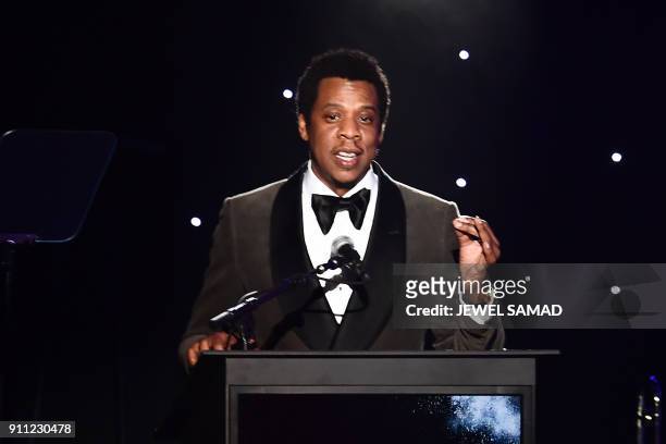 American rapper and businessman, Shawn Corey Carter, known professionally as JAY-Z, acknowledges his Industry Icon award during the traditionnal...