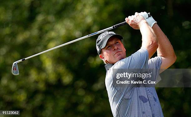 Steve Stricker tees off the 11th hole during the first round of THE TOUR Championship presented by Coca-Cola, the final event of the PGA TOUR...