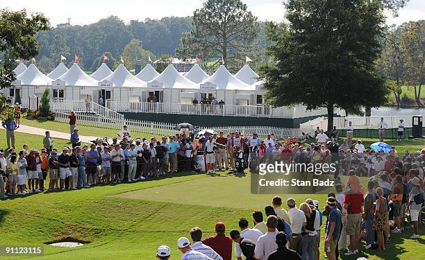 Tiger Woods hits from the 13th tee box during the first round of THE TOUR Championship presented by Coca-Cola, the final event of the PGA TOUR...