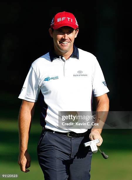 Padraig Harrington of Ireland walks off the 16th green during the first round of THE TOUR Championship presented by Coca-Cola, the final event of the...