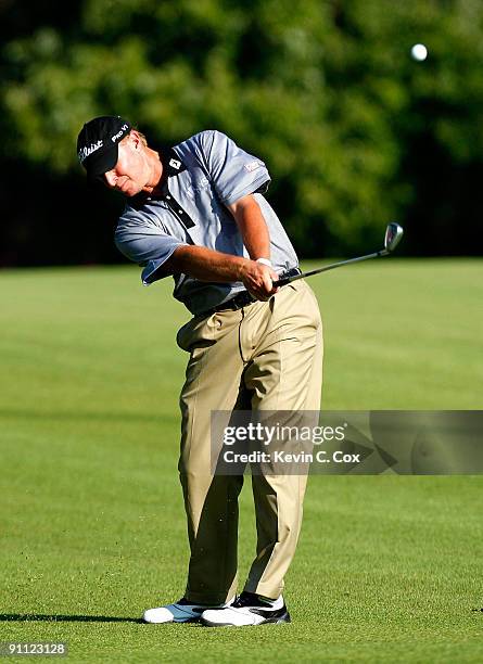 Steve Stricker plays his second shot from the 14th fairway during the first round of THE TOUR Championship presented by Coca-Cola, the final event of...