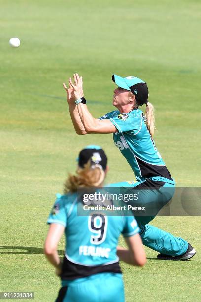 Kirby Short of the Heat catches Nicola Carey of the Thunder during the Women's Big Bash League match between the Sydney Thunder and the Brisbane Heat...
