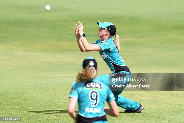 Kirby Short of the Heat catches out Nicola Carey of the Thunder during the Women's Big Bash League match between the Sydney Thunder and the Brisbane...